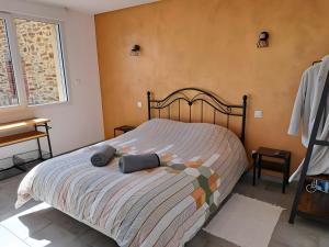 Postel nebo postele na pokoji v ubytování Studio Le Jardin