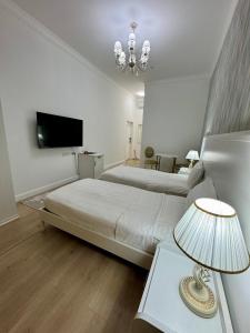 TV/trung tâm giải trí tại Hotel Astoria +10 ảnh