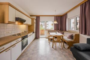 Kuchyň nebo kuchyňský kout v ubytování Pension Gabl