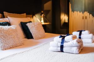 En eller flere senge i et værelse på Boutique vakantiehuis Het Stalhuys