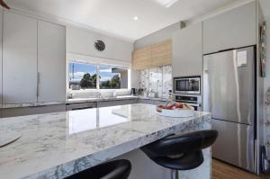 Køkken eller tekøkken på In CBD! 3bed! LOTR Cinema Experience! All Perks!