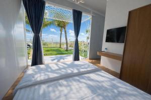 Postel nebo postele na pokoji v ubytování Wind Hills