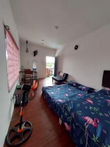 En eller flere senge i et værelse på Granny Palace Pendang Kedah + 31 billeder