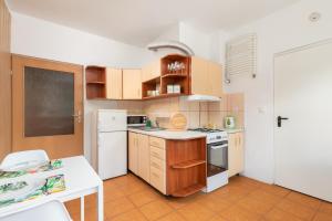 Kuchyň nebo kuchyňský kout v ubytování Dom Rooms of Poland - 500m od Suntago + 14 fotografií