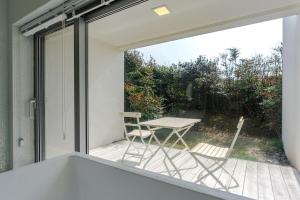 En balkon eller terrasse på 제주 무이펜션