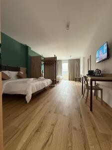 TV a/nebo společenská místnost v ubytování Luxury Rooms San Lorenzo