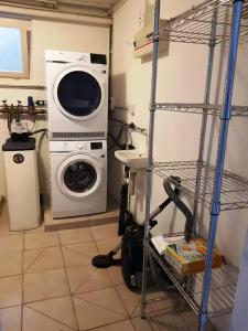 Kuchyň nebo kuchyňský kout v ubytování Pause cocooning - wifi - parking