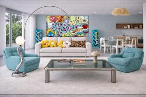 a living room with a couch and two chairs and a table at Pop villa in La Celle-sous-Gouzon