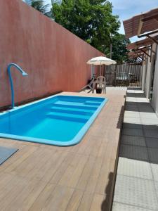 Swimmingpoolen hos eller tæt på Pousada Flor da Barra