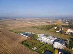 an aerial view of a farm and a field at Kwatery Smroków in Smroków