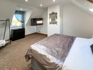 En eller flere senge i et værelse på Graeme-An-Taoiseach Uk50061