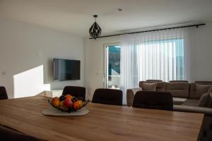 Et tv og/eller underholdning på Alpen Sky Apartments