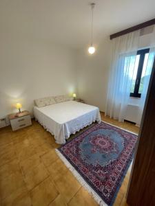 En eller flere senge i et værelse på Prenda e Mare