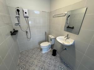 a bathroom with a toilet and a sink at KataKeet in Kata Beach +44 photos