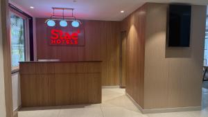 a hotel lobby with a sign that reads star hotels at Stae Residency Hitec City in Hyderabad