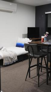 Et tv og/eller underholdning på Meraki Guesthouse + 11 billeder