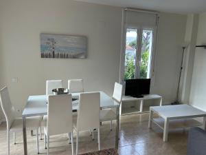 TV a/nebo společenská místnost v ubytování Apartamentos ELMA1