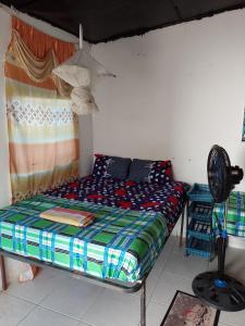 En eller flere senge i et værelse på SoSun House