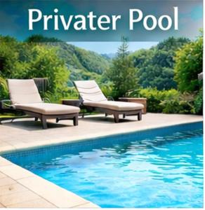 Swimmingpoolen hos eller tæt på Ferienhaus Vida