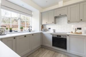 Køkken eller tekøkken på Honeysuckle Cottage, Kailzie