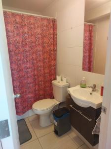 Et badeværelse på Depto cerca playa