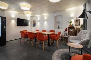 Et tv og/eller underholdning på dreamcation Altstadthotel - Mikro Apartments mit Küche & Self Check-In