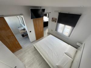 En eller flere senge i et værelse på Princesa 202