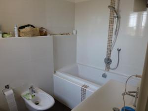 a bathroom with a sink and a toilet and a shower at Charming villa - perfectly located in Roquefort-les-Pins +20 photos