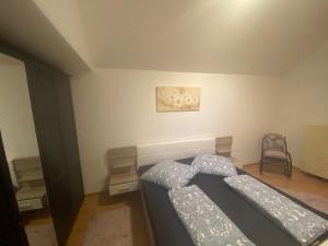 Postel nebo postele na pokoji v ubytování Mainz Downtown Residence