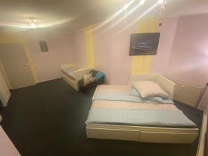 Postel nebo postele na pokoji v ubytování Mainz Downtown Residence