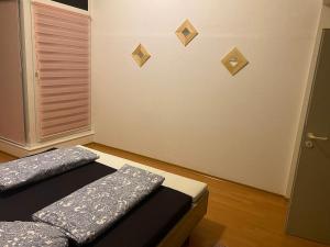 Postel nebo postele na pokoji v ubytování Mainz Downtown Residence