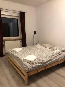 Postel nebo postele na pokoji v ubytování Apartament Cozy Studio