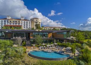 an aerial view of a resort with a swimming pool at Signia by Hilton La Cantera Resort & Spa in San Antonio