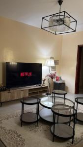 Et tv og/eller underholdning på شقه بالقرب من الحرم النبوي