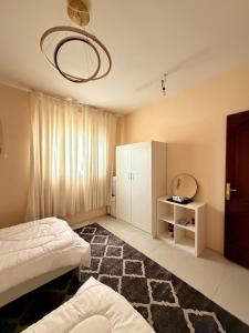 En eller flere senge i et værelse på شقه بالقرب من الحرم النبوي