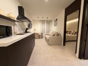 Køkken eller tekøkken på Apartamentos Máximo Parking gratis + 16 billeder