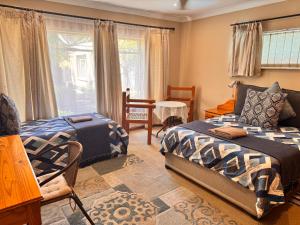 Ένα ή περισσότερα κρεβάτια σε δωμάτιο στο Tula@159