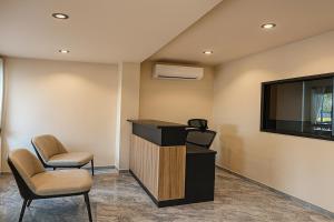 Et tv og/eller underholdning på Sand Maré Karon Hotel + 42 billeder