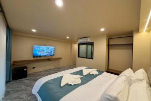 Et tv og/eller underholdning på Sand Maré Karon Hotel