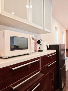 Køkken eller tekøkken på Osaka Lodge Midori - Designer House by Mitsui Home