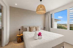 En eller flere senge i et værelse på Tidal Tranquility - Aquamarine 3