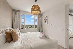 En eller flere senge i et værelse på Tidal Tranquility - Aquamarine 3 + 34 billeder