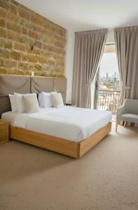 Un pat sau paturi într-o cameră la Senator Boutique Hotel +116 fotografii