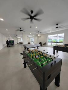 Herní místnost v ubytování Faeizal Homestay + 4 fotografie