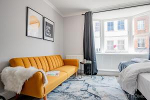 En eller flere senge i et værelse på Guest Stays - Bridge Street Studio 3