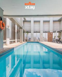 Swimmingpoolen hos eller tæt på Xtay Guarulhos Aeroporto - Aconchegante e a 16min do Aeroporto