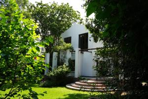 En have udenfor The House On Straight Avenue