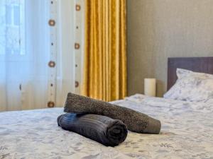 En eller flere senge i et værelse på DurAsset Home