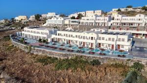 an aerial view of a hotel with a resort at Splendour Hotel and Suites in Firostefani