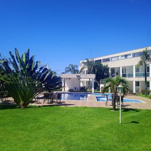 Hồ bơi trong/gần GUARAJUBA-VILLAGE BELLA LUNA